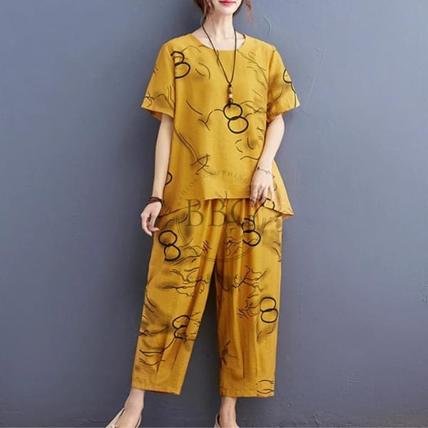 YELLOW HALF SLEEVES PRINTED CAPRI SETS