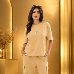 Unisex Drop-Shoulder T-Shirt – Desert Sand with Center Logo
